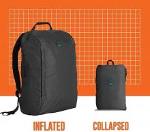 grey rucksack on a white and orange back round with the word 'inflated' under it, next to a smaller grey pouch with the world 'collapsed' under it 