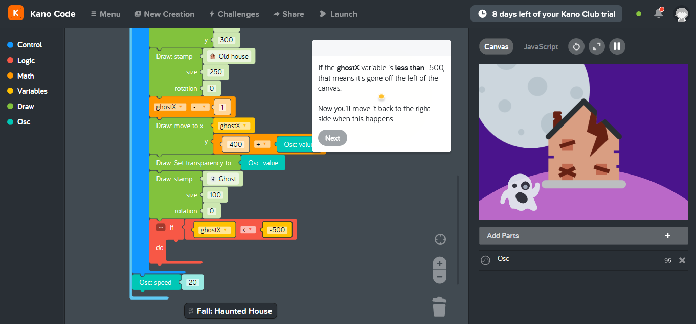 Playing the Haunted House coding game. Code appears in colourful building blocks for kids to put together. At the side, a haunted house animation is part-way through being built by the code.