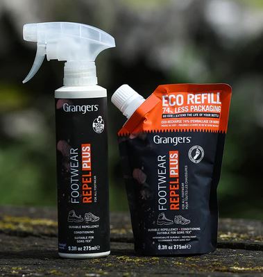 Image of Grangers Repel Plus spray bottle and eco refill pouch, sat on wooden surface. 