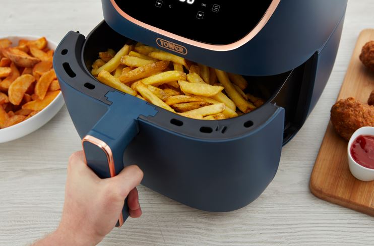 airfryer basket containing chips 