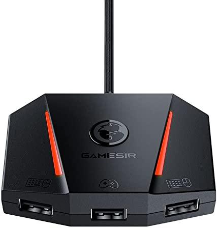 The GameSir VX2 AimBox, plugged in, with two keyboard and mouse ports, one console controller port