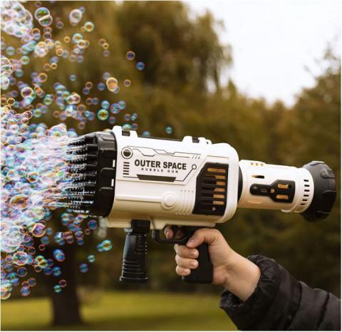 Bubble Gun Extreme shooting out bubbles in a garden. 