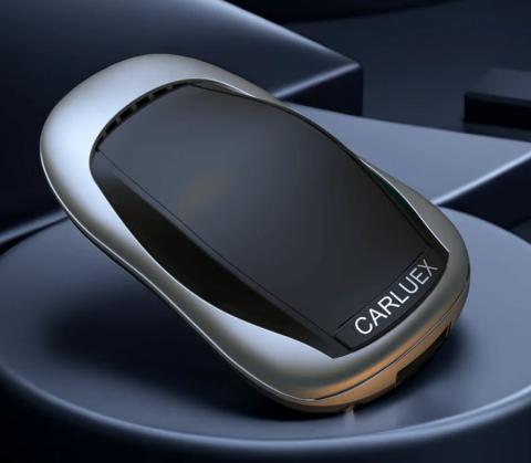 car-shaped dongle on a grey platform 