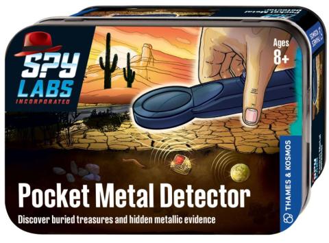 small metal tin with 'pocket metal detector' on the front, with a cartoon image of a hand holding a small metal detector 