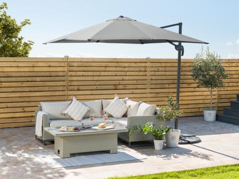 parasol over garden furniture 