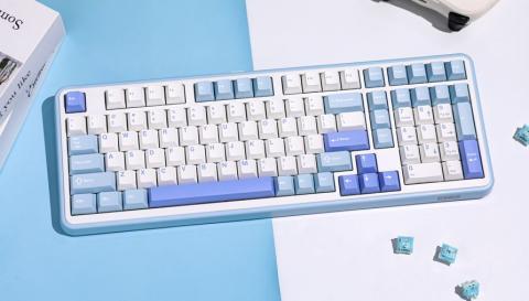 white and blue keyboard on a split white and blue background 