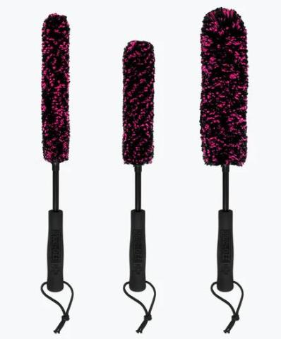 Three black and pink microfiber cleaning brushes with black handles, arranged vertically side by side. 