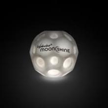 The MoonShine ball glows on a dark background