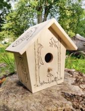 Gruffalo Paint Your Own Bird House out in the garden 