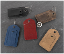 Waterfield luggage tags in black, red, brown, leather ta, and blue. 