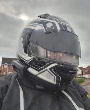 person wearing motorbike helmet