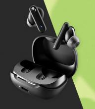 black wireless ear buds and black charging case on a black and green background 