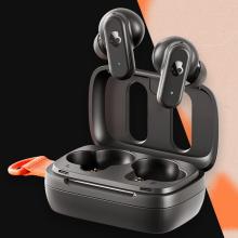 black earbuds above their black charging case on an orange and black background