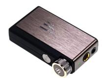 small rectangular unit with blacks side and brushed copper top with the 'iFi' logo on it, the unit has a silver dial on the side and 2 headphone ports at the top on a white background 