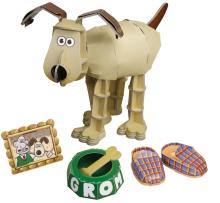 cardboard dog figure with cardboard bowl, slippers and picture frame
