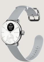 watch with digital screen on clock face showing heart rate and the watch has a light grey/white strap
