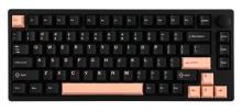 black keyboard with pink/peach space, Esc, arrow and enter keys, all on a white background 