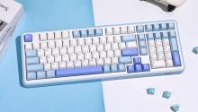 white and blue keyboard on a split white and blue background 