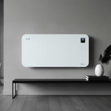 white wall mounted glass heater on a grey wall above a small table 